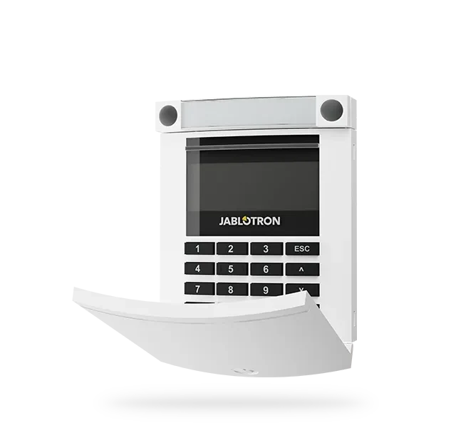 JABLOTRON segment keypad behind the phone